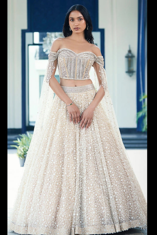 Beige Embossed Lehenga Choli