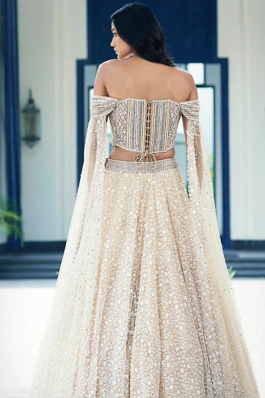 Beige Embossed Lehenga Choli